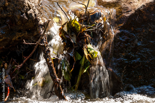 tiny river waterfall