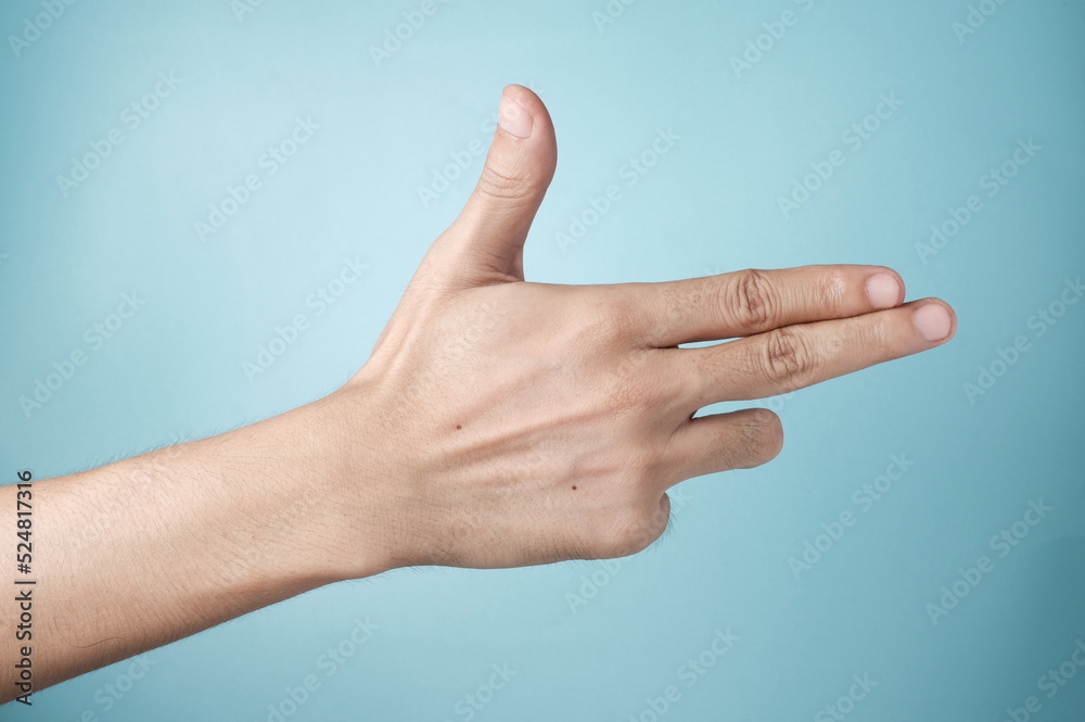 hand showing gun gesture 