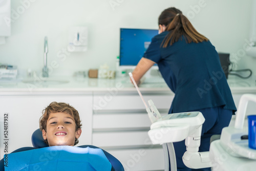 Boy during visit in dental clinic photo