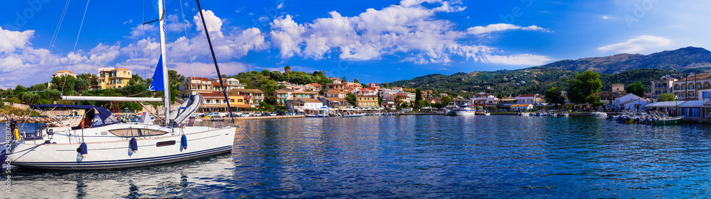 Greece, Corfu island. view of Kassiopi  traditional fishing village - popular tourist destination