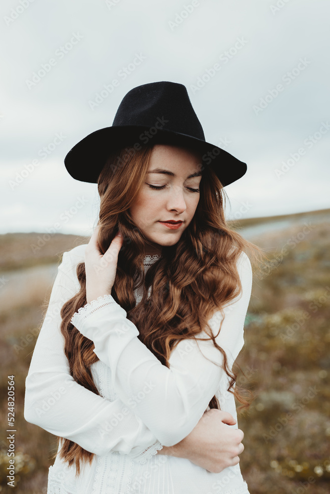 Young hipster woman in the countryside