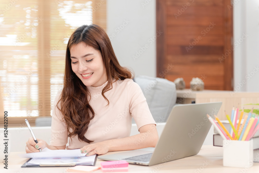 Adult online learning concept, Asian beauty learning online from home via computer, a new normal online activity. Adult online learning concept, Asian beauty learning online from home via computer, a new normal online activity.