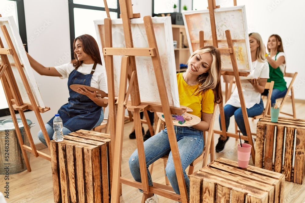 Group of young artist girls smiling happy drawing at art studio. Group of young artist girls smiling happy drawing at art studio.