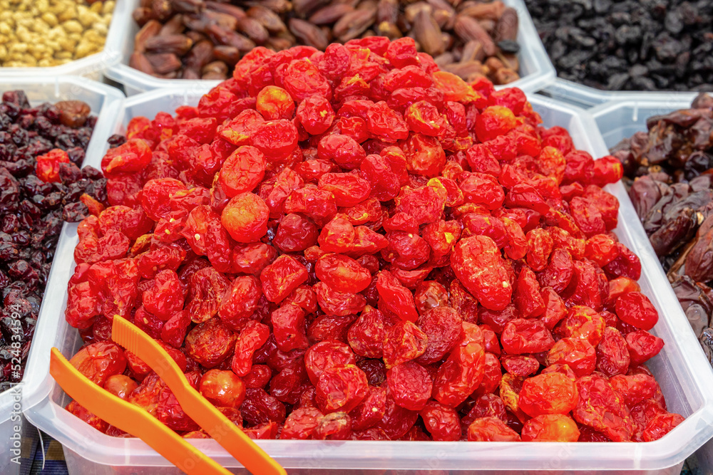 Dried tomatoes are sold at the street market. Close-up Dried tomatoes are sold at the street market. Close-up