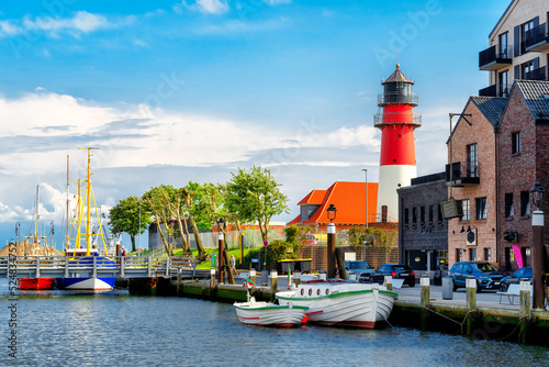 Foto Small fisher boats are moored in the harbor of Büsum in North Frisia, Germany