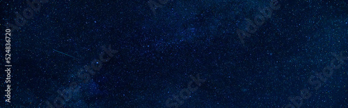 Starry Milky Way at night with stars on the background of a dark blue night sky