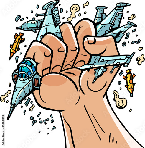destroyed military aircraft. Pacifism. Protest against the war. Fist squeezes military equipment. Rage against Militarism