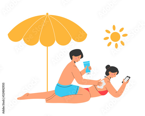 Boy and girl on beach put sunscreen on skin