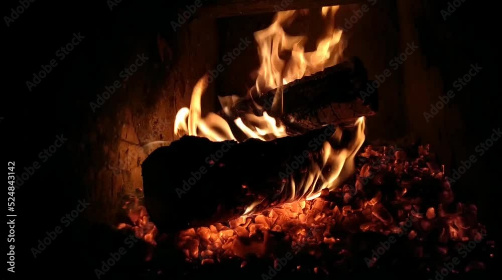 Fire in the stove with a festive atmosphere in the cold season Fire in the stove with a festive atmosphere in the cold season