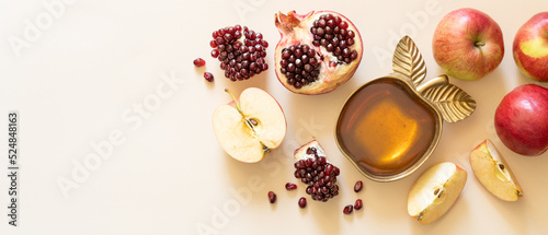 Photos Rosh hashanah concept - honey, pomegranate and apples