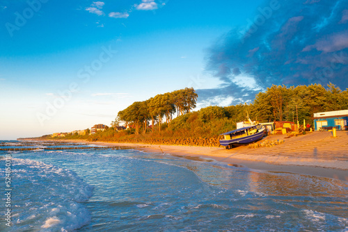 Fototapeta Naklejka Na Ścianę i Meble -  view of the coast of the Baltic Sea in Ustronie Morskie at sunset. Poland