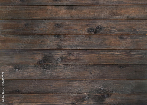 wooden dark brown old background. textured wooden boards with knots and natural pattern