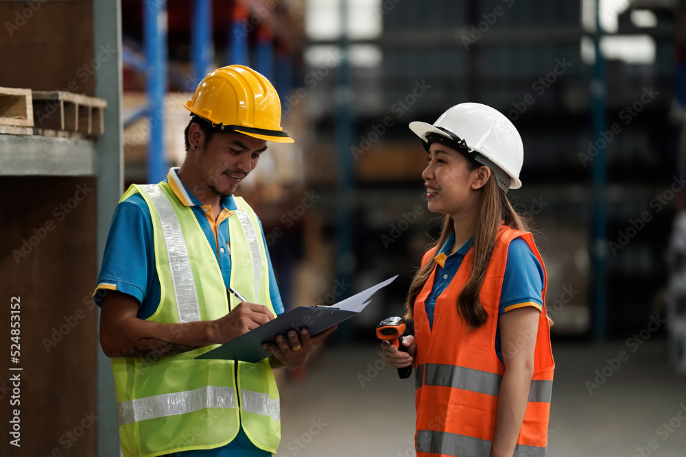 Warehouse workers selling stock checks with tablets and bar code launcher,business idea Warehouse workers selling stock checks with tablets and bar code launcher,business idea