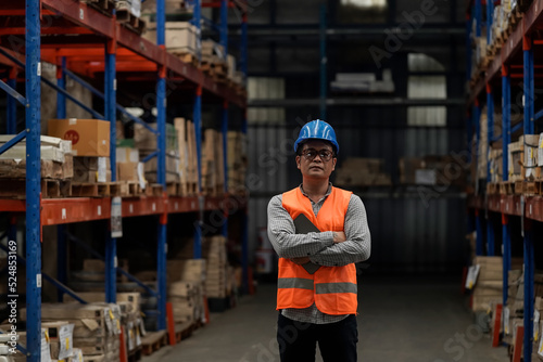 Warehouse workers selling stock checks with tablets .