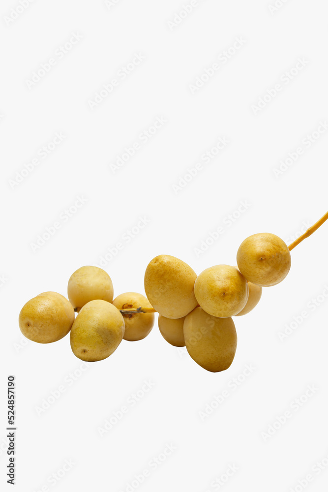 Pile of tasty sweet fresh dates isolated on white background..