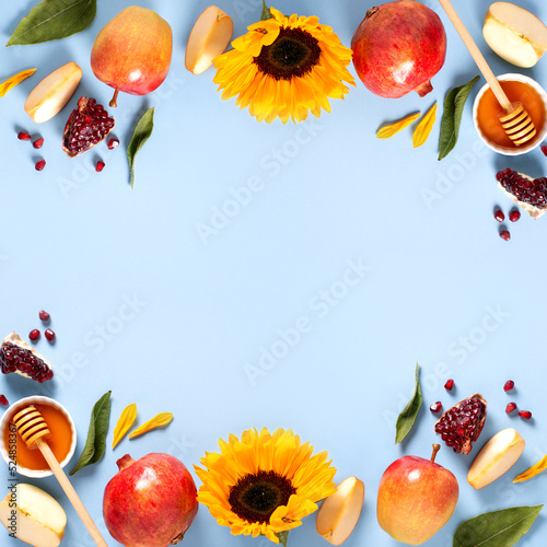 Fototapeta Naklejka Na Ścianę i Meble -  Jewish holiday Rosh Hashanah greeting card with apples, honey and flowers