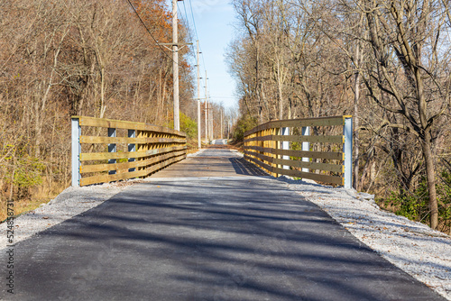 Multipurpose or multiuse bike trail in fall. Rail trail, outdoor recreation and bike path safety concept. photo