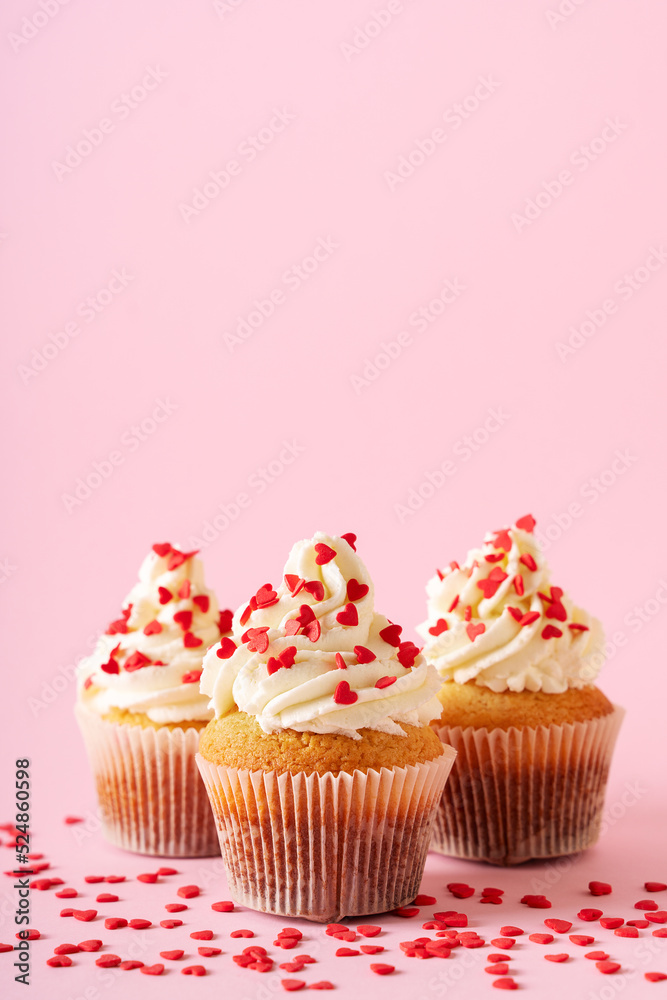 Vanilla cupcakes close up on with confectionery sprinkles Vanilla cupcakes close up on with confectionery sprinkles