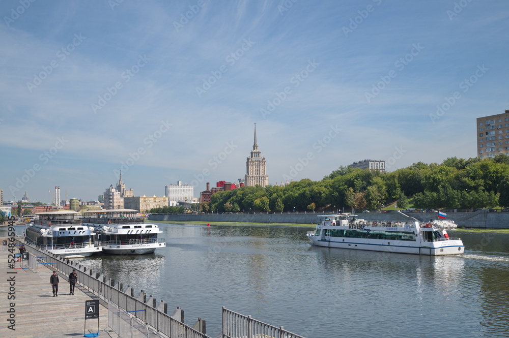 Moscow, Russia - August 12, 2022: Summer view of Taras Shevchenko embankment and pleasure boats
