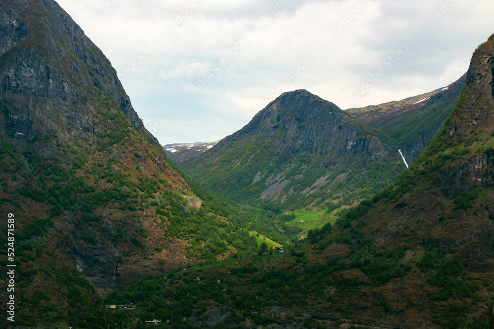 Fototapeta premium Amazing beautiful view of the Nærøyfjord in Norway Scandinavia with snow mountains and colorful fjord