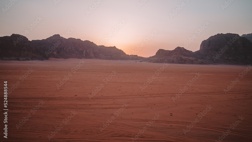 Tourist observes the panorama in the desert Wadi Rum, Jordan Tourist observes the panorama in the desert Wadi Rum, Jordan