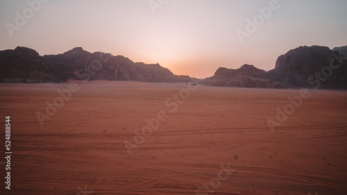 Tourist observes the panorama in the desert Wadi Rum  Jordan