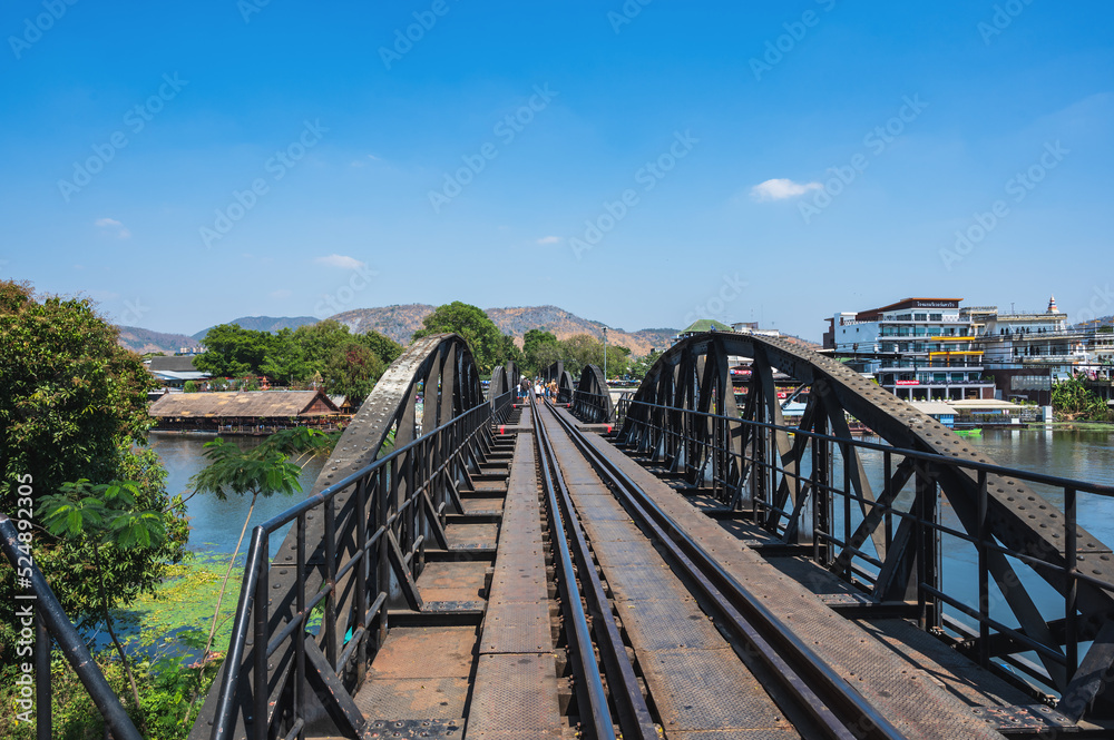 kanchanaburi.thailand-16.01.2022:Unacquainted people at kawi river bridge at kanchanaburi.The Kwai River Bridge was part of the meter-gauge railway constructed by the Japanese during World War Two