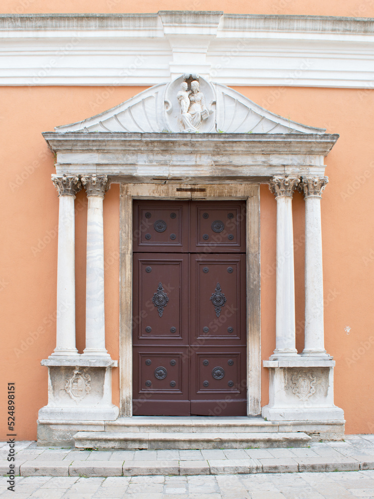 Ornamented door of the old church of St Simeon in Zadar, Croatia, famous travel destination