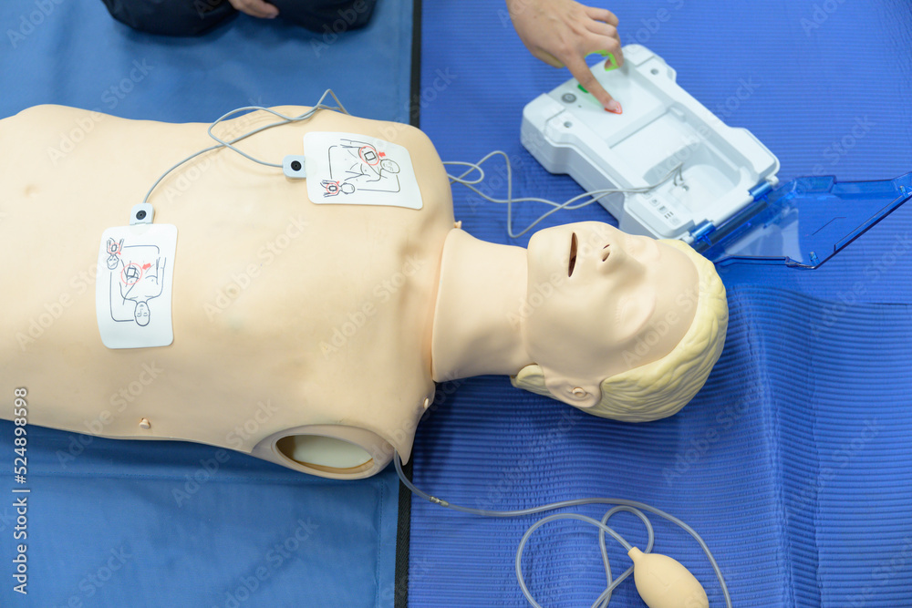 Demonstrating CPR (Cardiopulmonary resuscitation) training medical