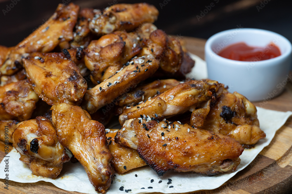delicious fried chicken wings with sauce delicious fried chicken wings with sauce