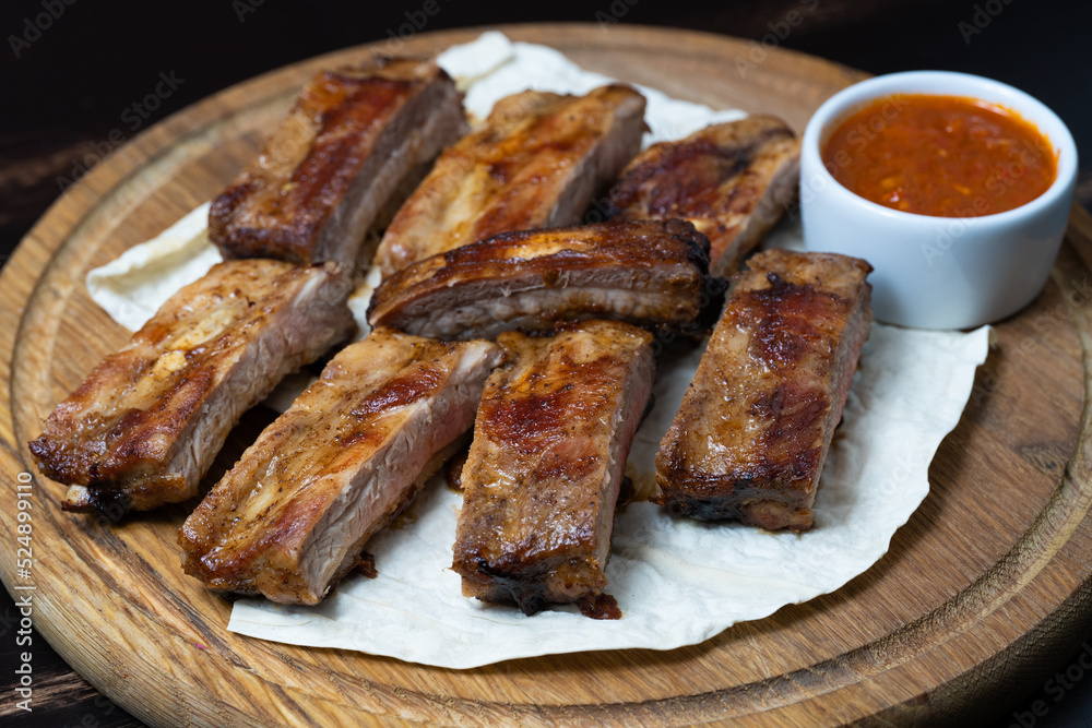 delicious ribs with sauce