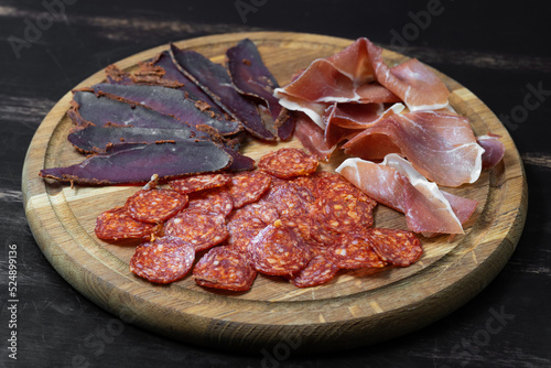 sliced ham meat sausages on the festive table