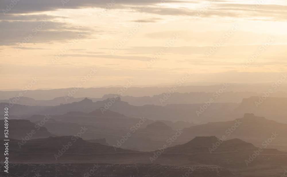 Scenic American Landscape and Red Rock Mountains in Desert Canyon. Spring Season. Canyonlands National Park. Utah, United States. Nature Background. Sunset Scenic American Landscape and Red Rock Mountains in Desert Canyon. Spring Season. Canyonlands National Park. Utah, United States. Nature Background. Sunset
