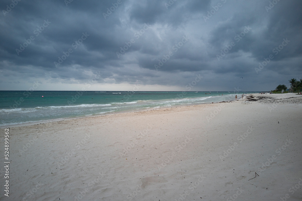 View of Xpu-Ha beach in Mexico during a thunderstorm