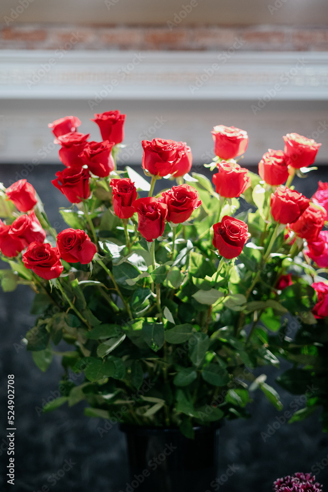 Red roses in a flower shop.Flowers in a flower shop. Concept flower