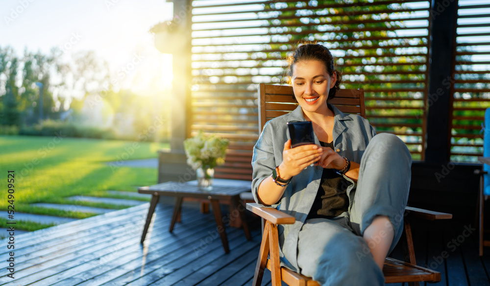 Fototapeta premium woman is using a phone