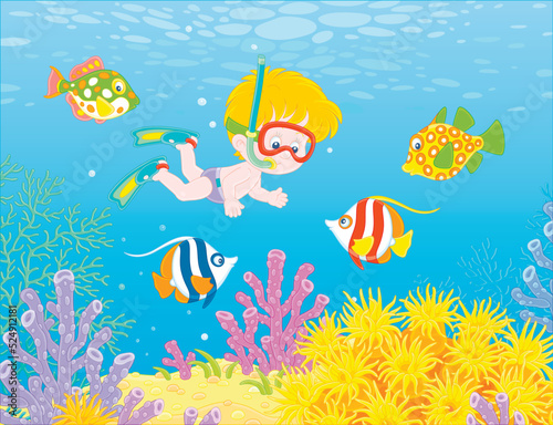 Little boy with a diving mask, flippers and a snorkel diving with merry colorful fishes in blue water of a tropical coral reef on summer vacation, vector cartoon illustration