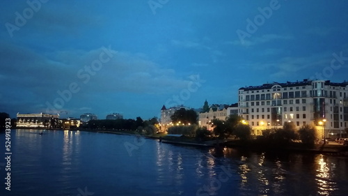 Urban landscapes. Night view of the embankment  the river and the buildings of St. Petersburg. Russia.