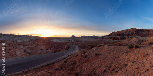 Scenic Road in Red Rock Mountains in the Desert at Colorful Sunrise. Spring Season. Goblin Valley State Park. Utah, United States. Nature Background Panorama © edb3_16