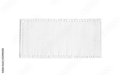 Blank clothing label isolated on white, top view photo