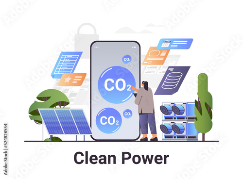 businesswoman analyzing clean power on smartphone carbon credit concept responsibility of co2 emission environment strategy