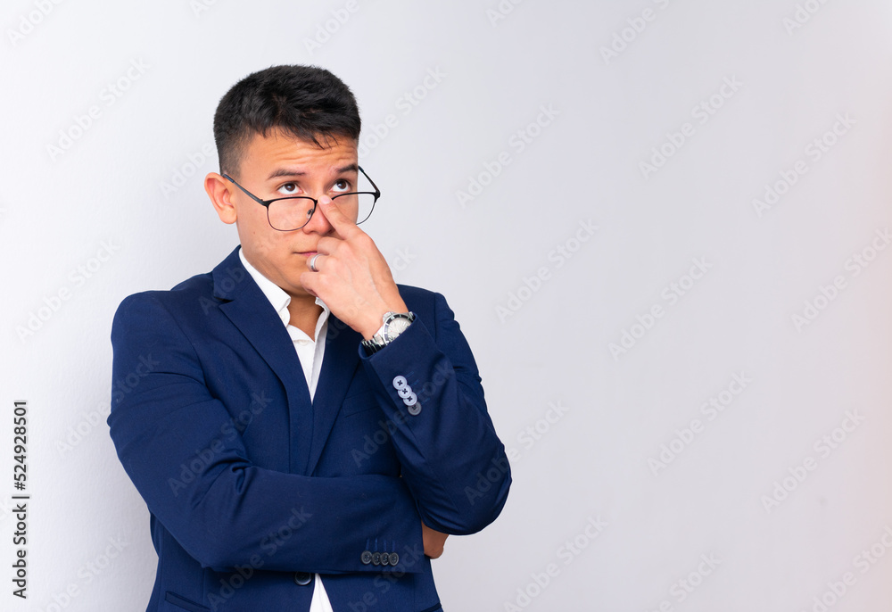 Latin entrepreneur latin entrepreneur is thinking with his glasses on Latin entrepreneur latin entrepreneur is thinking with his glasses on