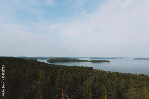 clouds over the lake in padasjoki, finland © Riina