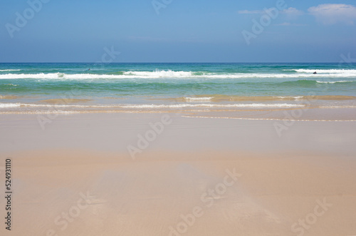 Surfers on the Malhao beach - Portugal
