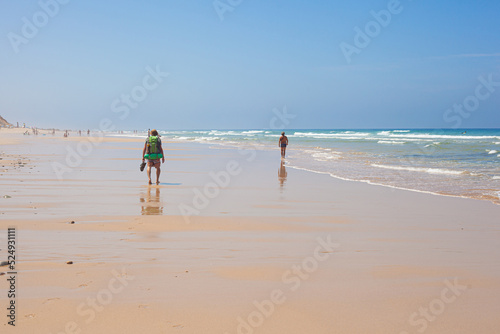 Hiker on the Malhao beach - Portugal