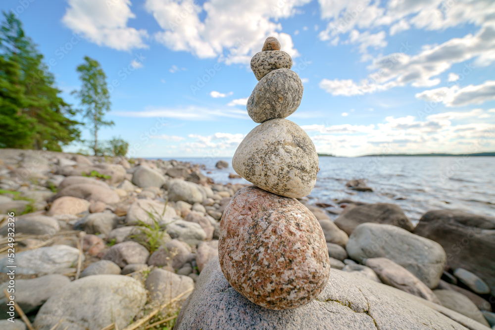 Pyramid of stones. Unstable balance of stone objects. Idyllic state of nature. Pyramid of stones. Unstable balance of stone objects. Idyllic state of nature.