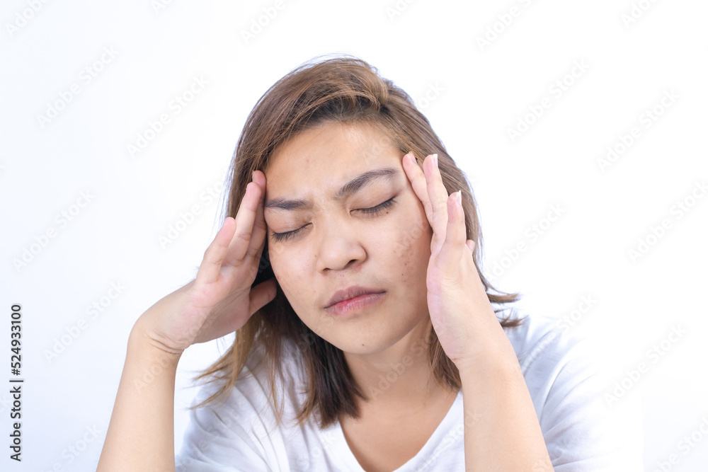 Asian woman suffers from headaches, migraines and stress, health problems Asian woman suffers from headaches, migraines and stress, health problems