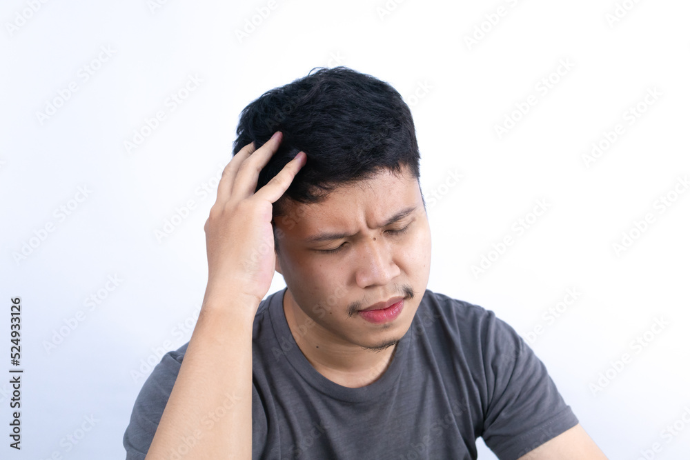 Asian men suffers from headaches, migraines and stress, health problems Asian men suffers from headaches, migraines and stress, health problems