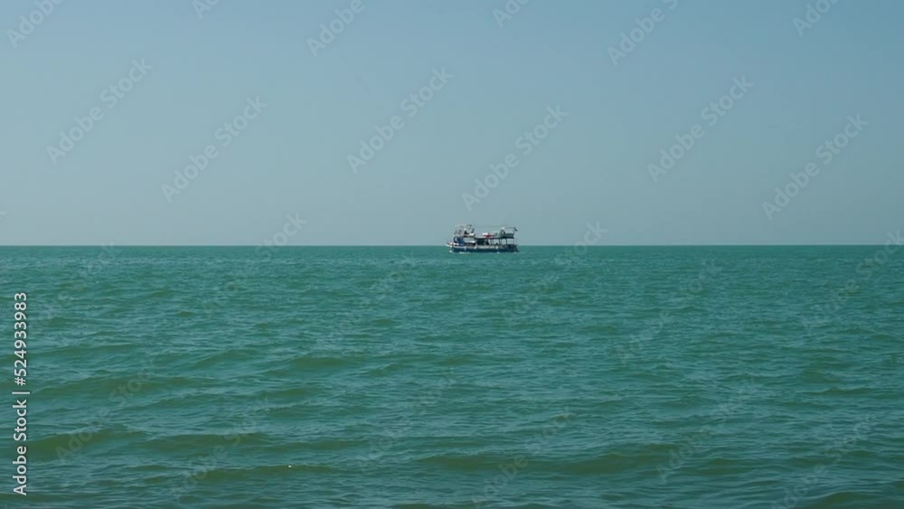 The ship is sailing on the sea. Pleasure boat. Rest on the sea. View from the beach. Meditative state. Flow
The ship is sailing on the sea. Pleasure boat. Rest on the sea. View from the beach. Meditative state. Flow