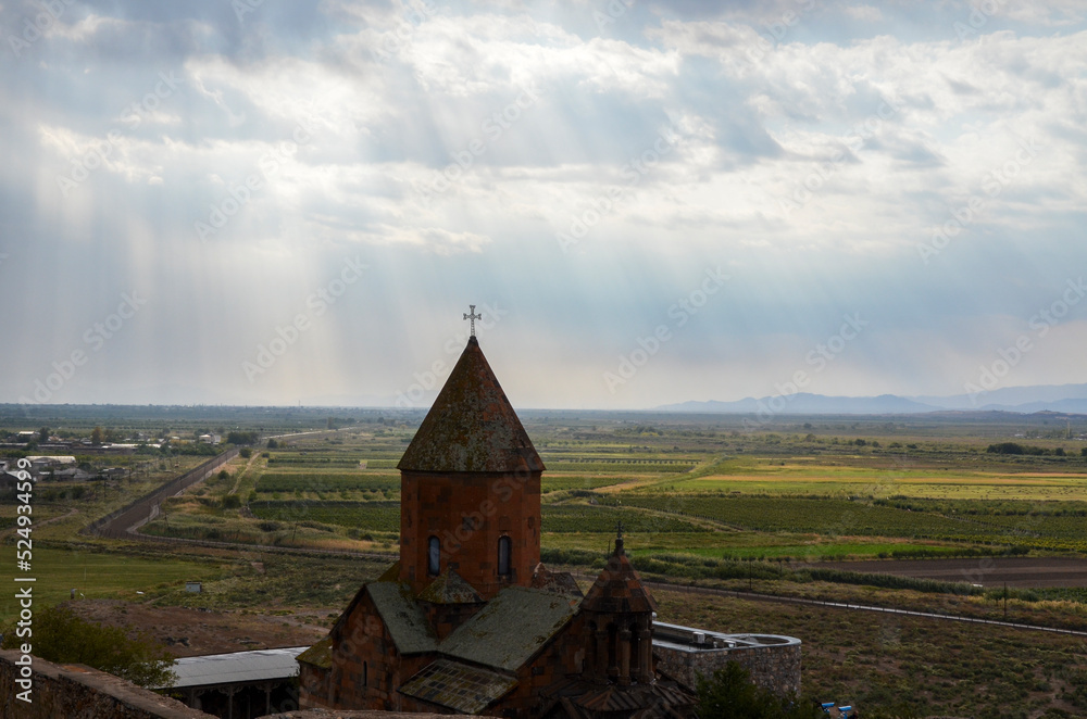 Khor Virap Monastery and stone cross at the hill in the Ararat valley, near the border with Turkey. Armenia